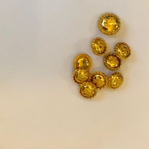 Set of 9 gold H buttons.